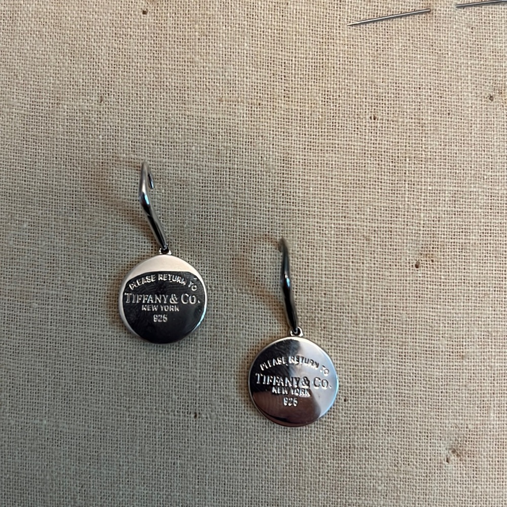 Tiffany & Company round disc drop dangle “Return to Tiffany” earrings.